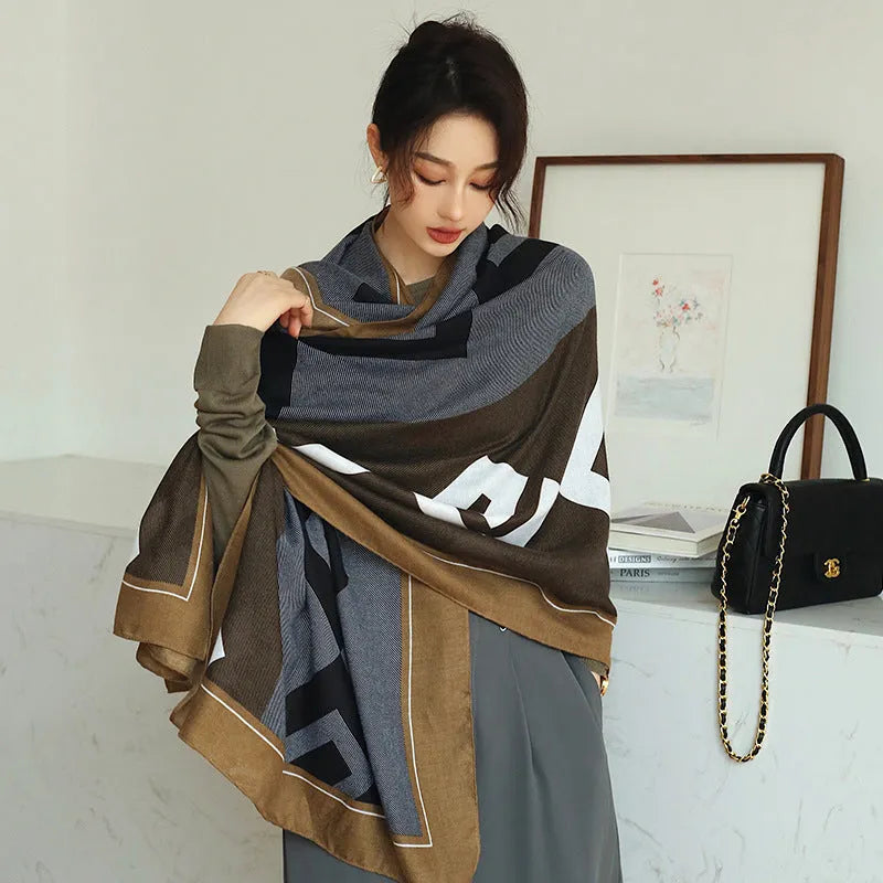 Polyester vintage print scarf draped to show 90x180cm dimensions and decorative pattern