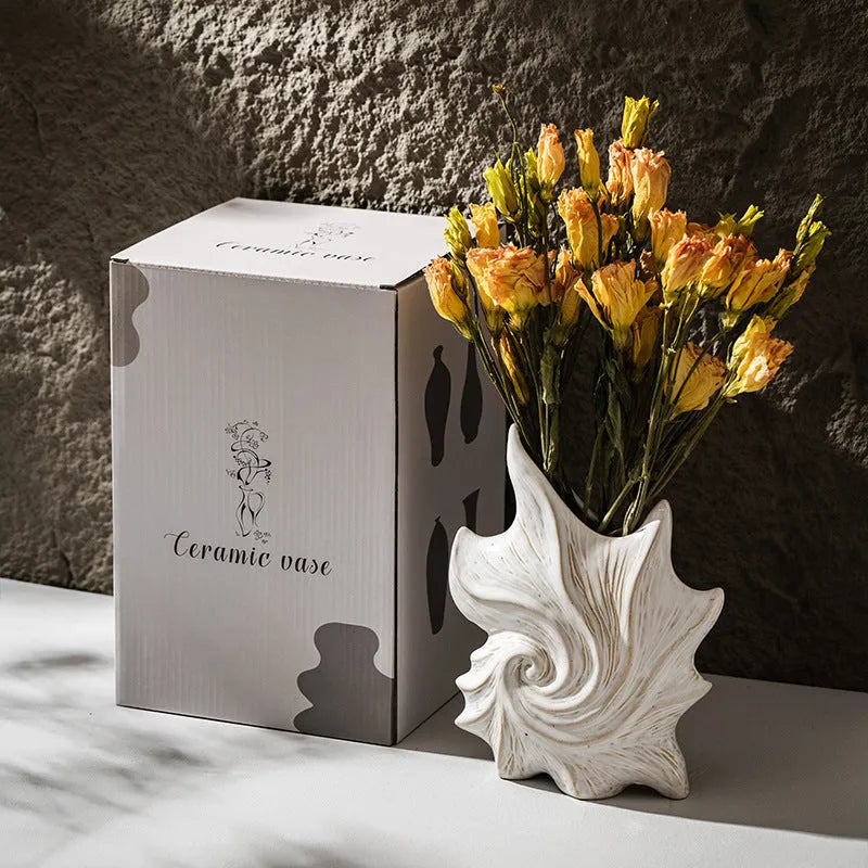 Hexagonal French ceramic vase with coloured glaze in a retro European style.