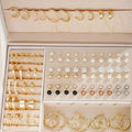 108 geometric alloy earrings with pearl elements in gold and yellow electroplated colours for women