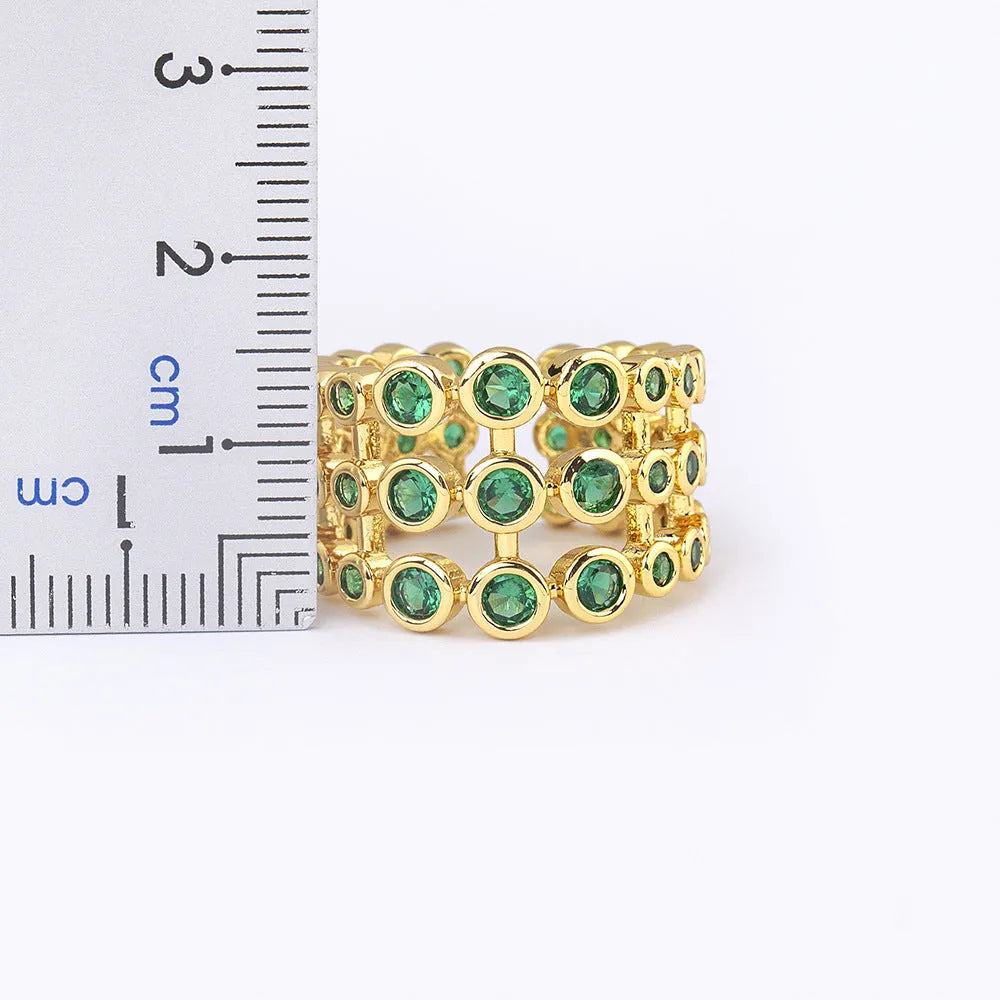 Wide copper ring with 18K gold plating and green zircon stones, unisex jewellery