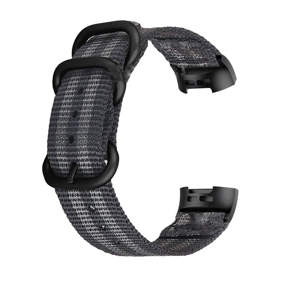Nylon replacement watch strap with three-ring buckle for Fitbit Charge 2, 3, 4, and 5 fitness trackers.