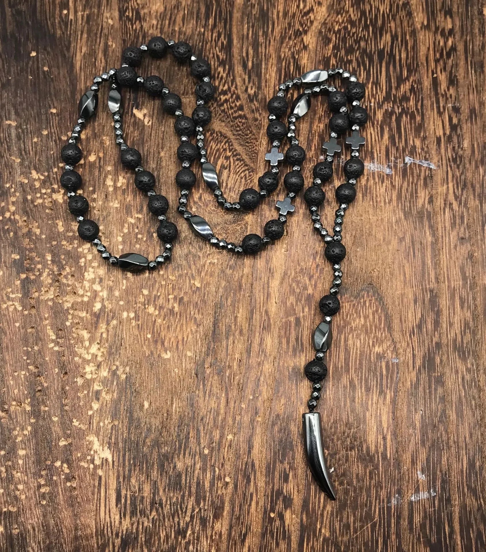 Men's stone cross pendant necklace with hand-woven detail on ball bead chain