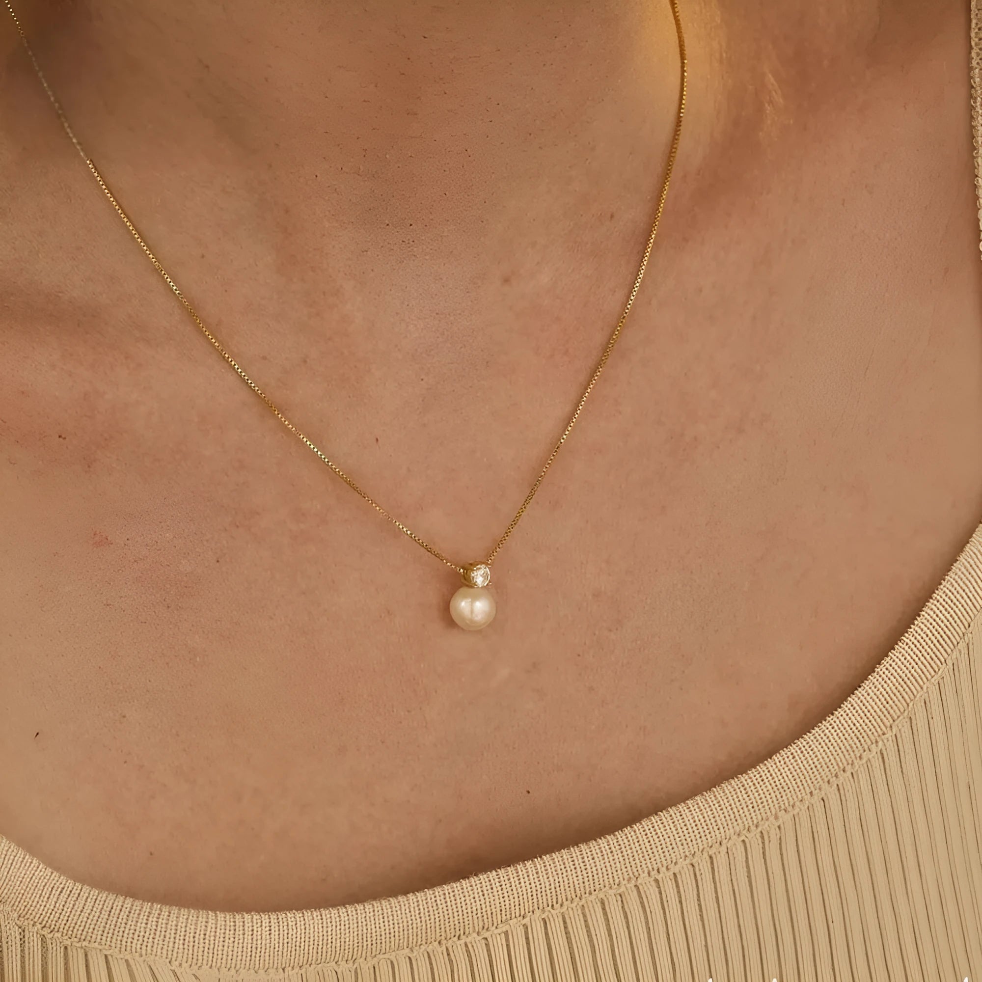 St Delan stainless steel necklace for women with imitation pearl and zircon pendant on a box chain.