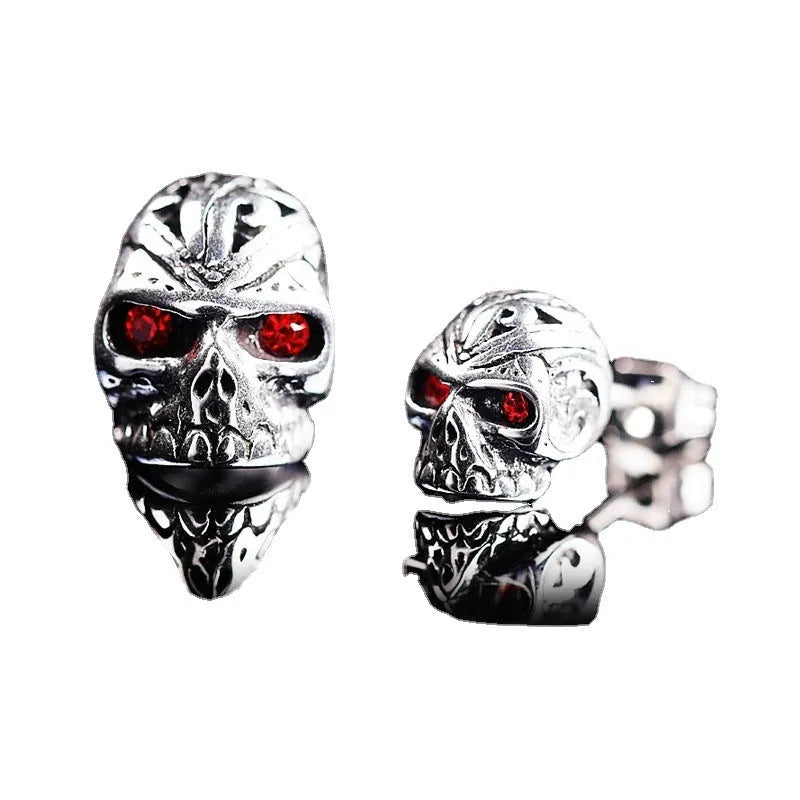 Retro red eye ghost head skull stud earrings with alloy construction and gemstone inlays