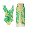 Solid colour women's one-piece swimsuit with thin spaghetti straps and a matching detachable skirt.