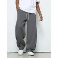 Men's straight leg casual trousers in black, dark grey and light grey colours with a drawstring waist.