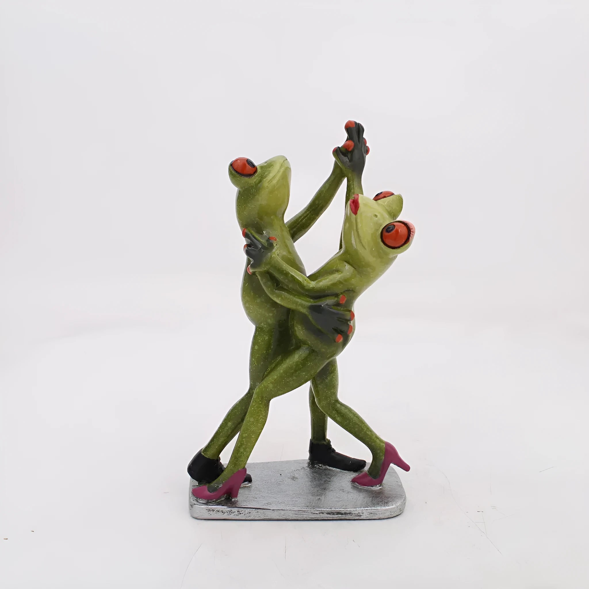 Pastoral style synthetic resin frog sculpture decoration for home interiors.