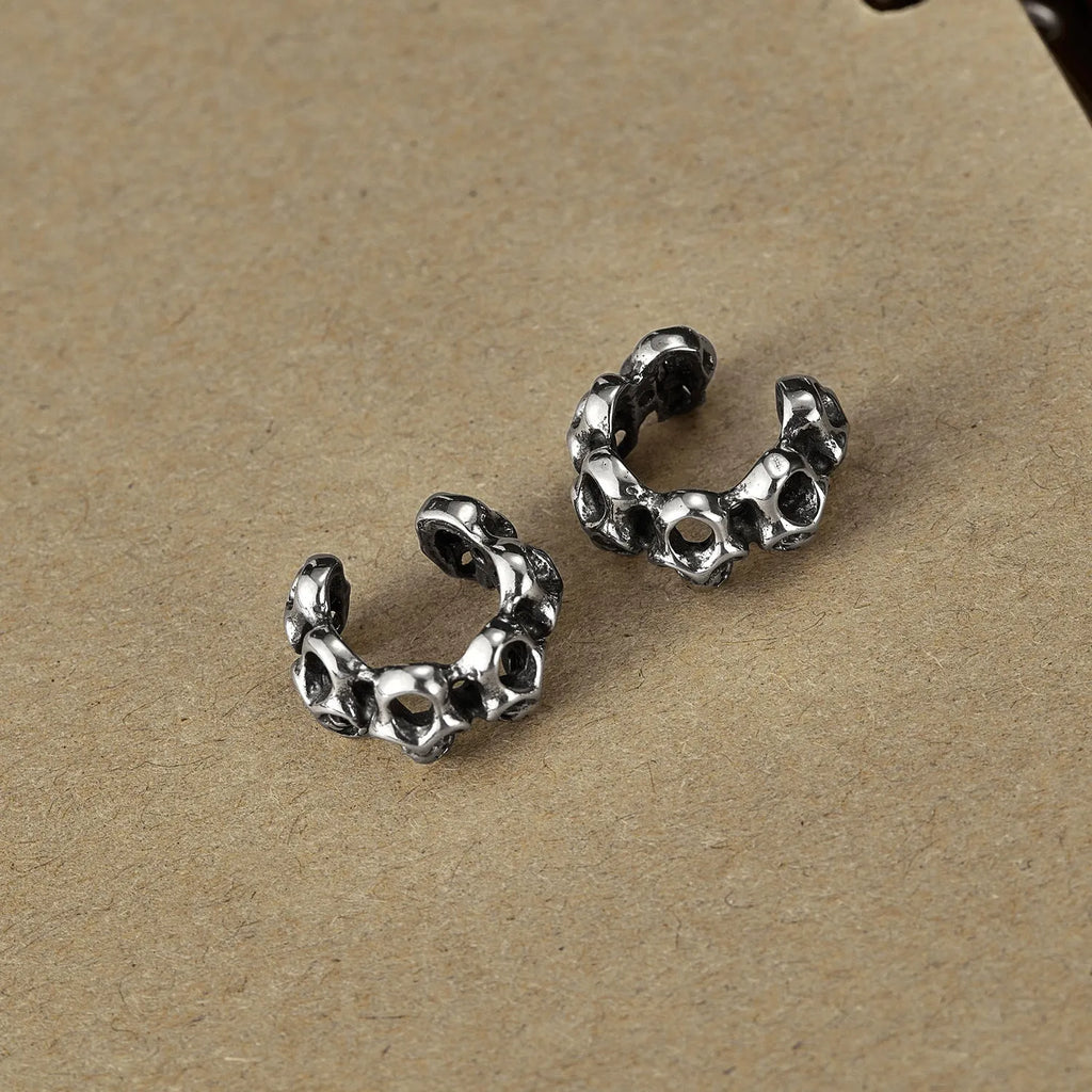 Retro hollow skull geometry stainless steel ear clips with electroplated finish for hip hop style