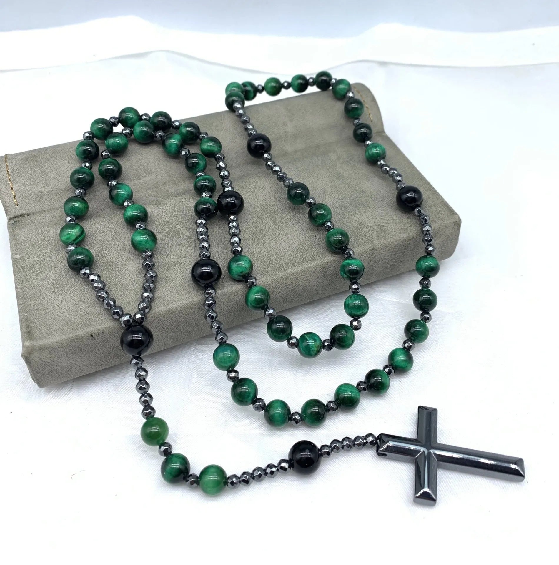 Men's stone cross pendant necklace with hand-woven detail on ball bead chain