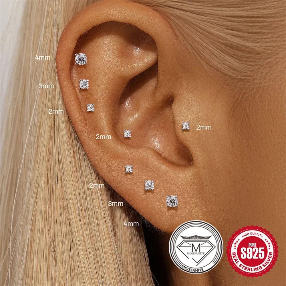 S925 sterling silver stud earrings with petal diamond debris design in platinum colour on white background.