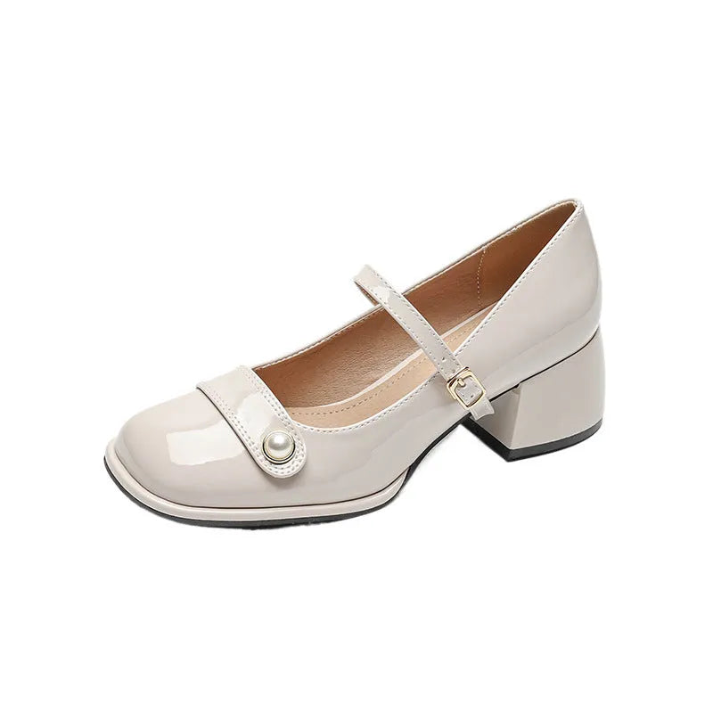 Women's patent leather chunky heel pump in apricot with square toe and buckle closure