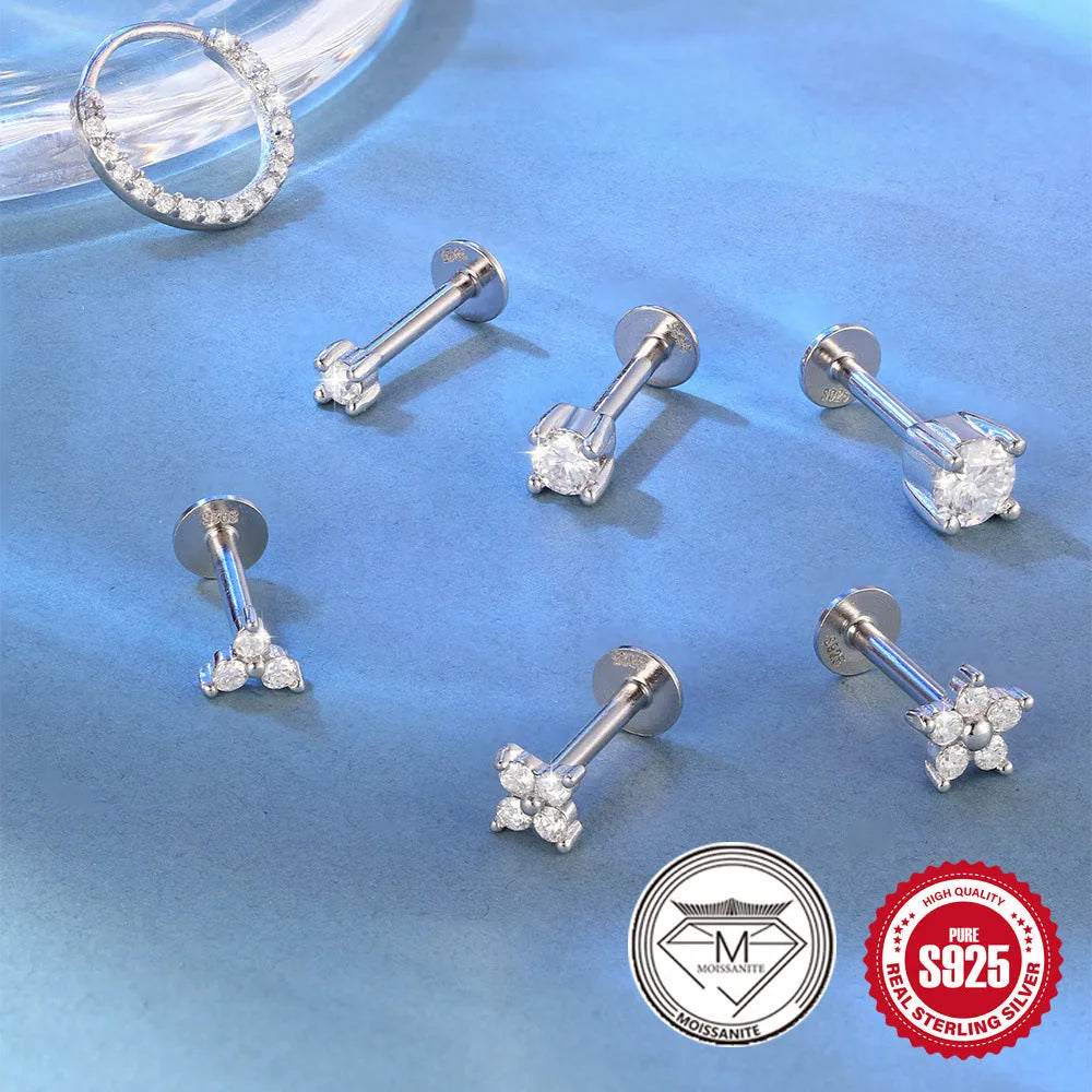 S925 sterling silver stud earrings with petal diamond debris design in platinum colour on white background.