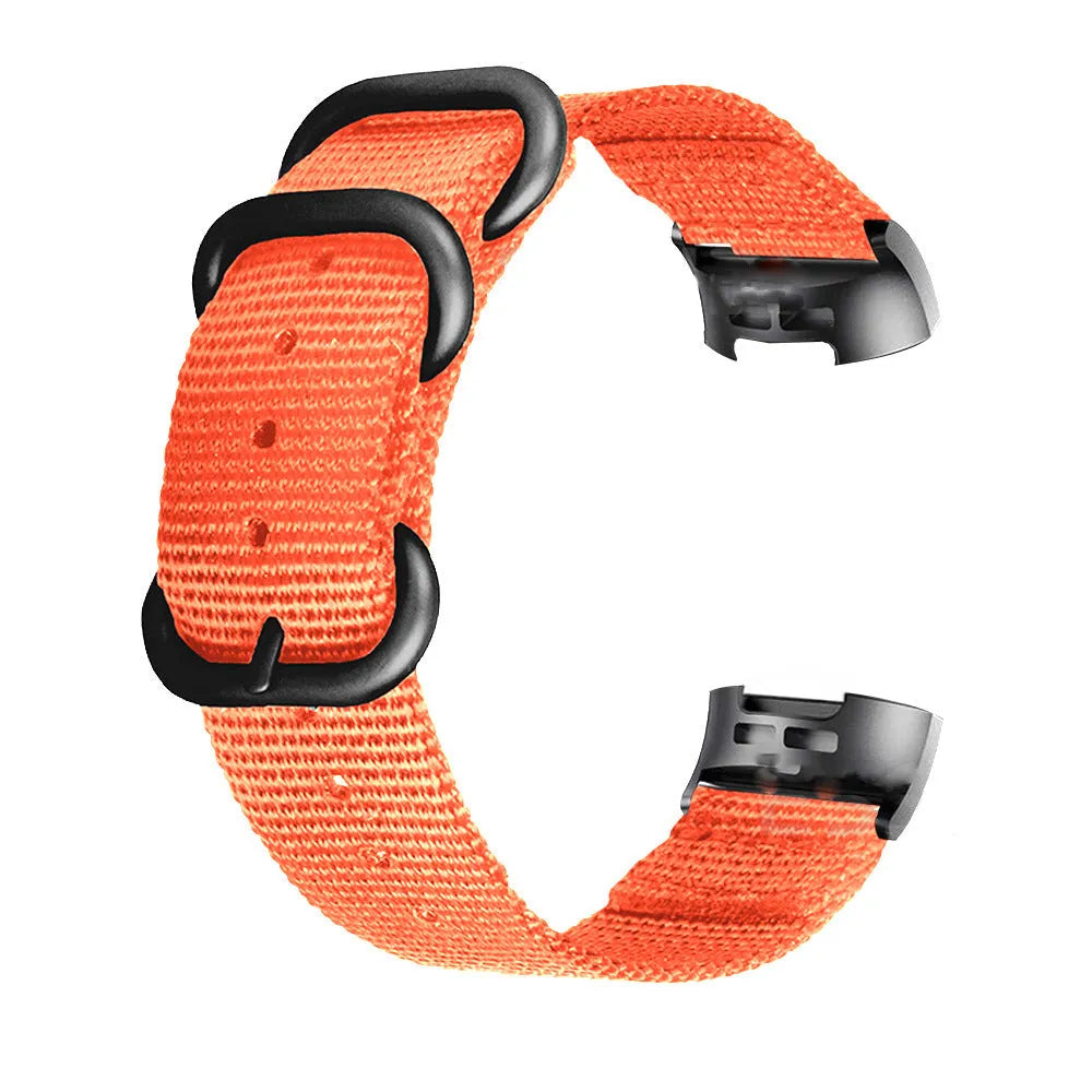 Nylon replacement watch strap with three-ring buckle for Fitbit Charge 2, 3, 4, and 5 fitness trackers.