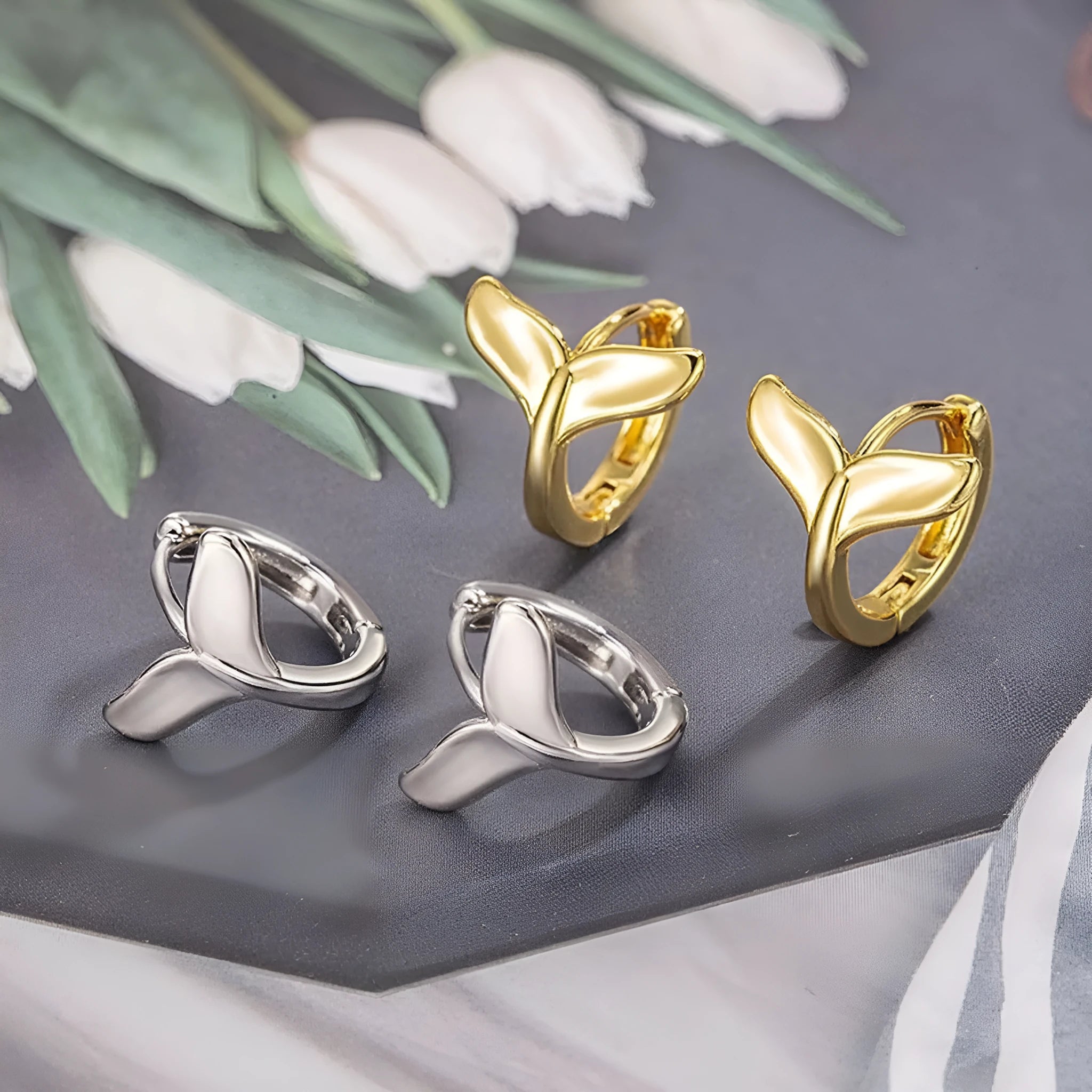 Women's fishtail earrings in copper with electroplated gold finish, simple all-match design