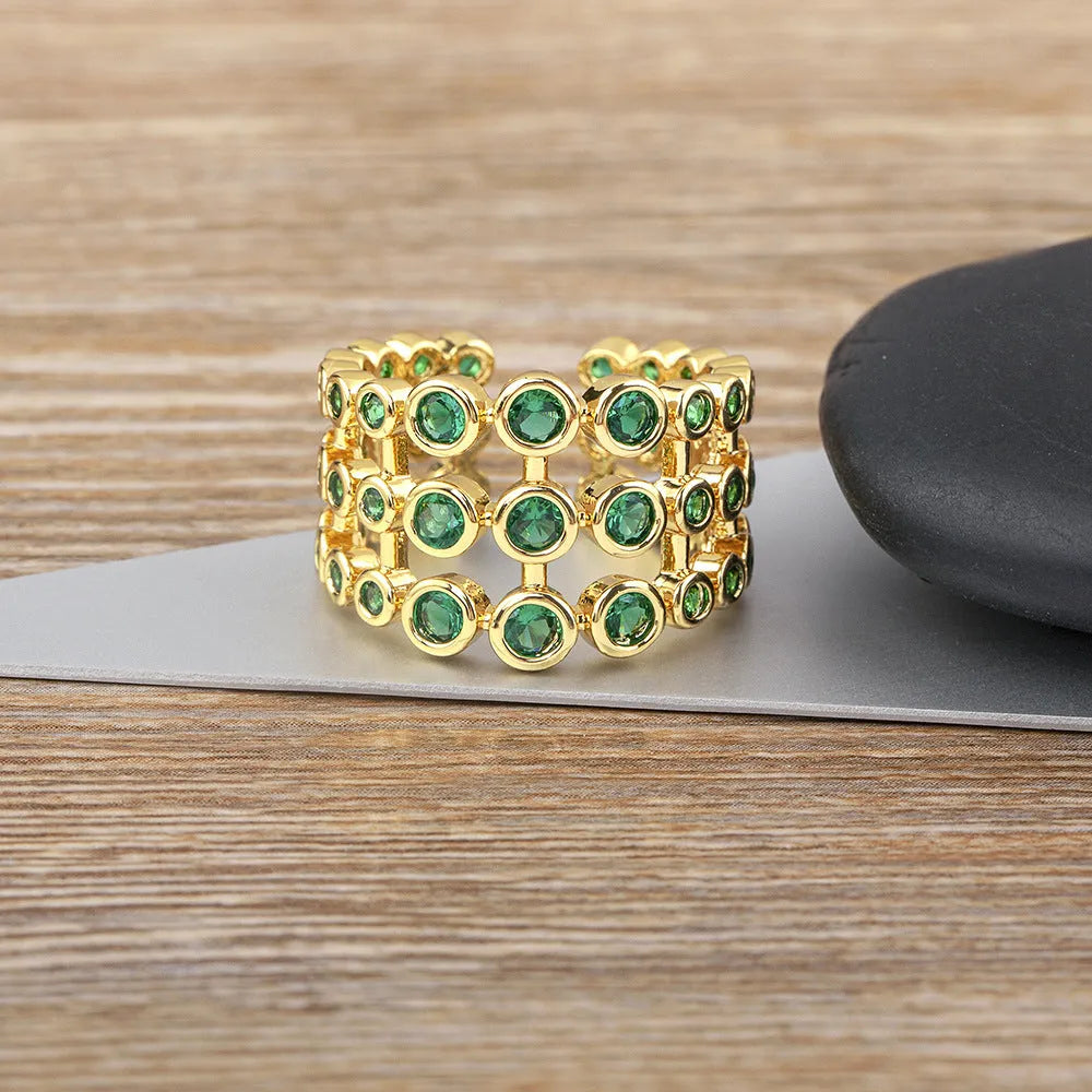 Wide copper ring with 18K gold plating and green zircon stones, unisex jewellery