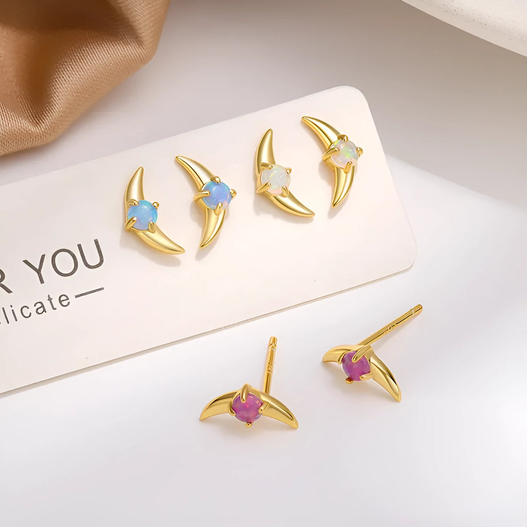 Women's 925 silver geometric earrings with electroplated finish and blue crystal stone.