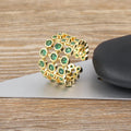 Wide copper ring with 18K gold plating and green zircon stones, unisex jewellery