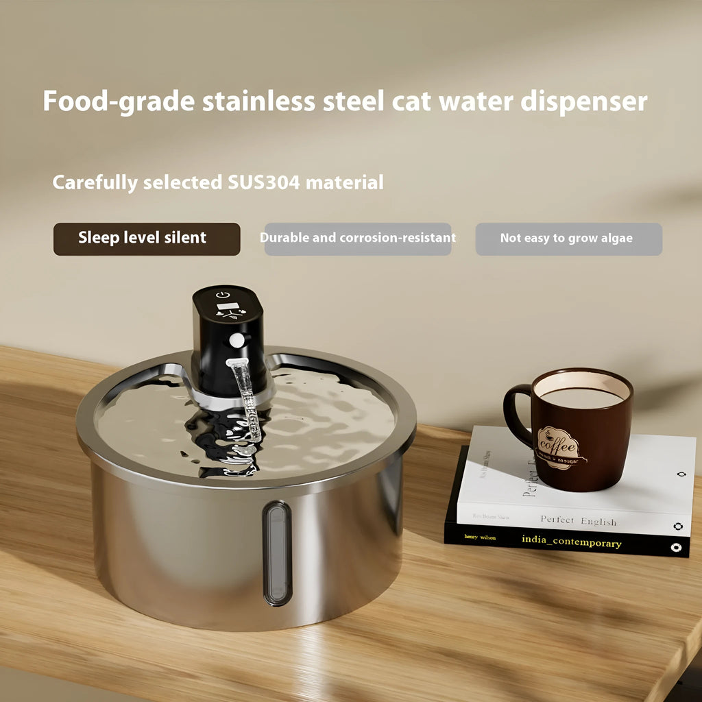 Stainless steel heated pet water fountain with charging cable on a white base.
