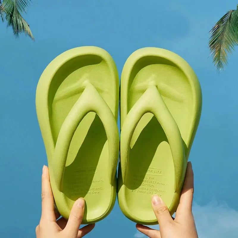 Solid colour EVA flip-flops with a thick sole and a decorative bow on the thong strap.