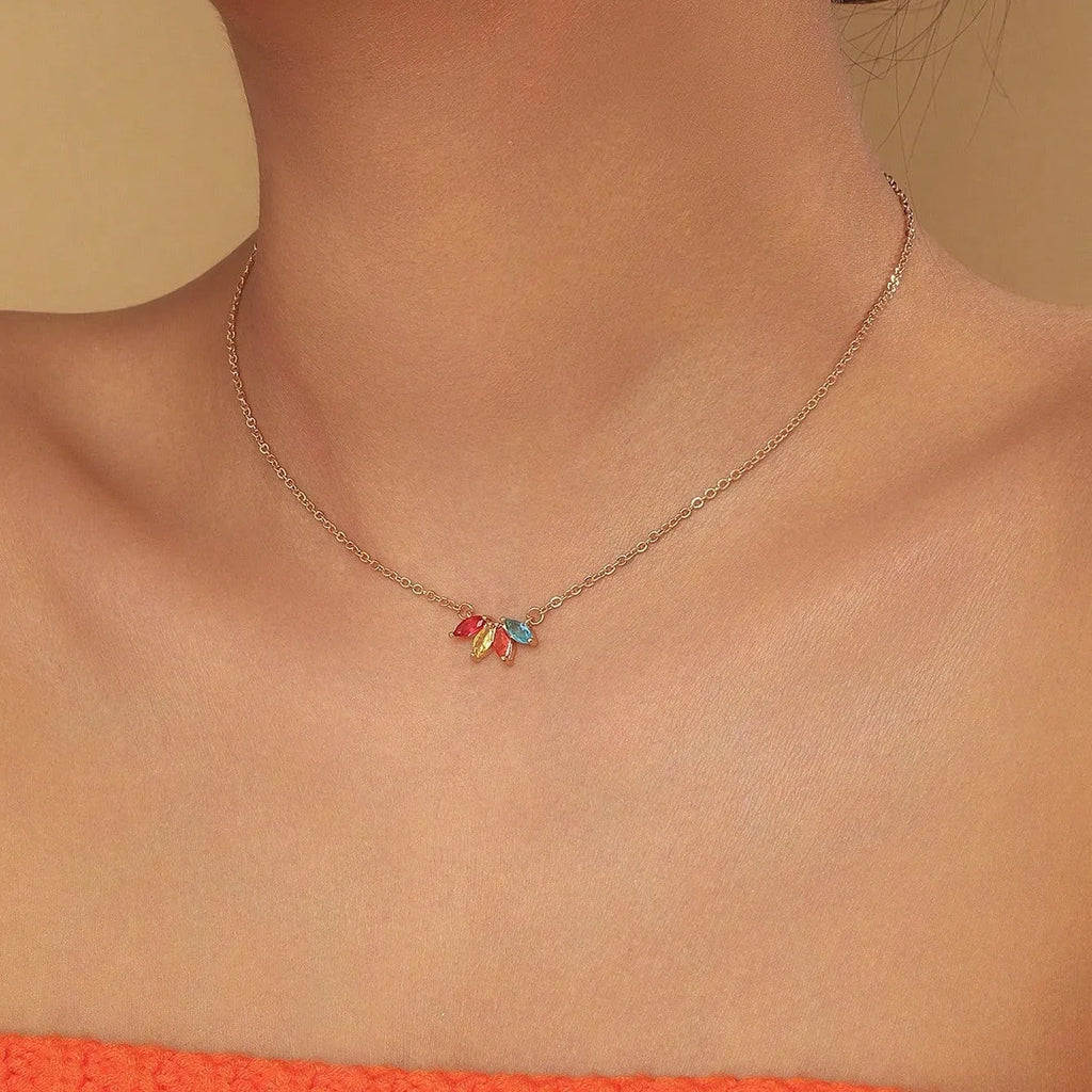 Rhinestone leaf necklace copper geometric pendant gold colour on display