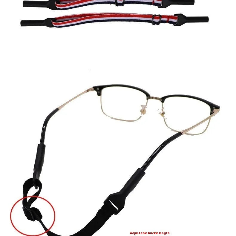 Black adjustable glasses cord with silicone ends shown fitted to a pair of spectacles