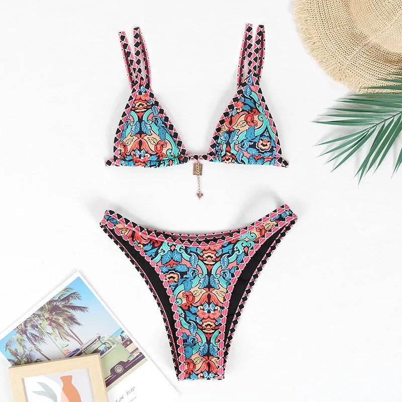 Retro printed women's bikini swimwear in polyester fabric showing orange, pink, black, and blue colour options