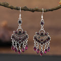A pair of smart water drop purple retro long fringe drop earrings made from alloy metal.