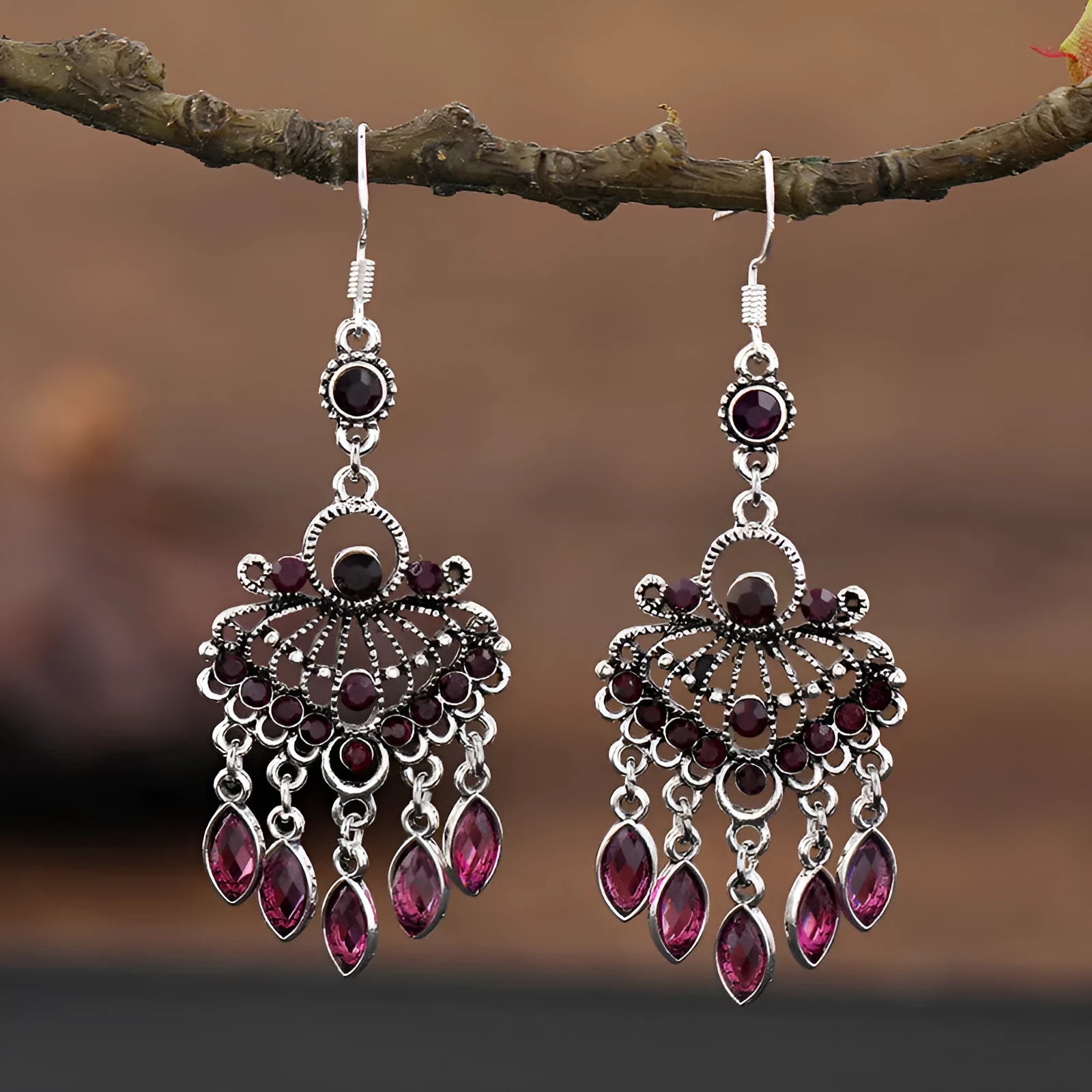 A pair of smart water drop purple retro long fringe drop earrings made from alloy metal.