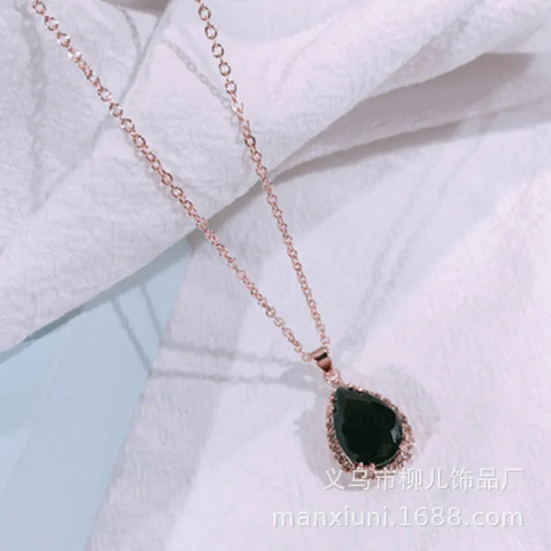 Rose gold geometric drop shape necklace with rhinestones in pink colour option