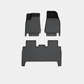 Tesla Model X waterproof rubber foot pads and TPE tailbox liner set for car interior protection.