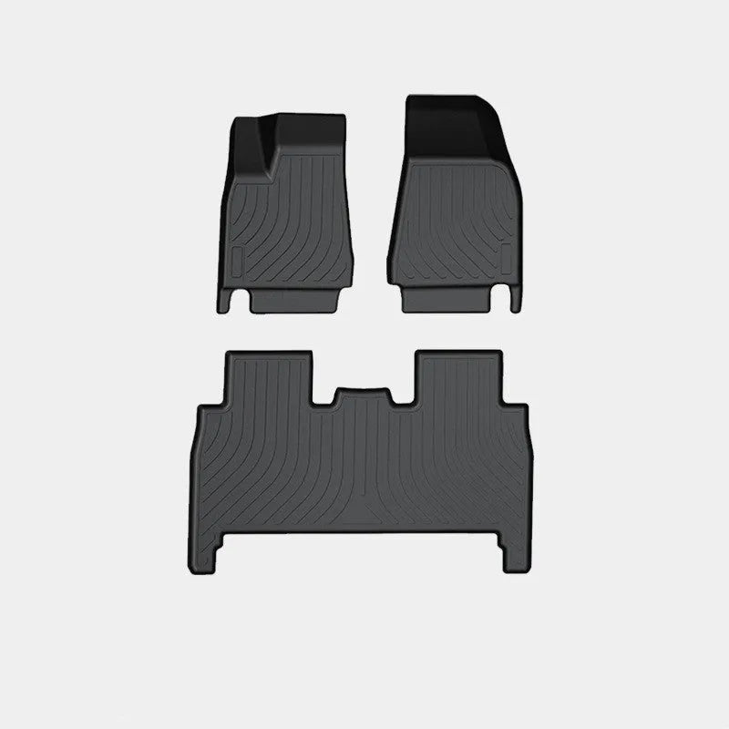 Tesla Model X waterproof rubber foot pads and TPE tailbox liner set for car interior protection.