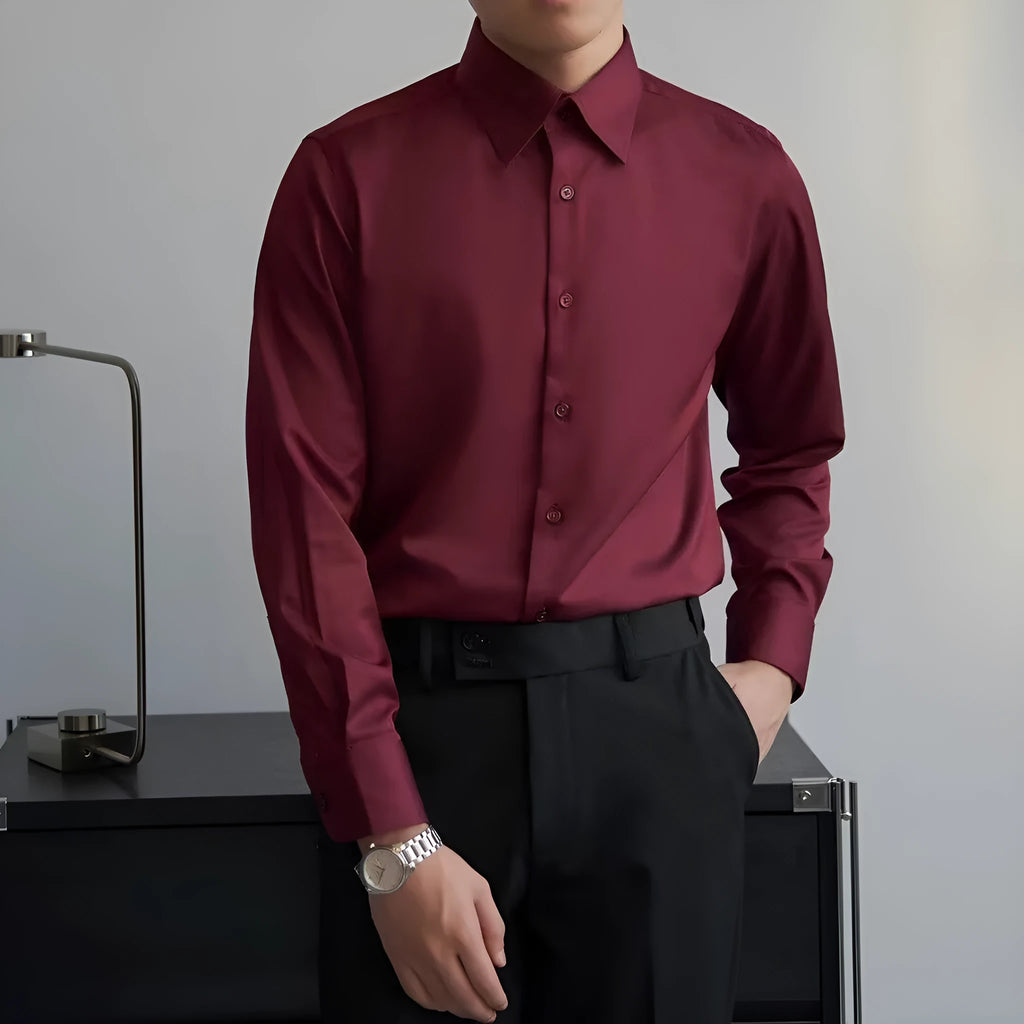 Man wearing a black long sleeve Korean style cardigan shirt with a loose fit and Japanese retro design details.