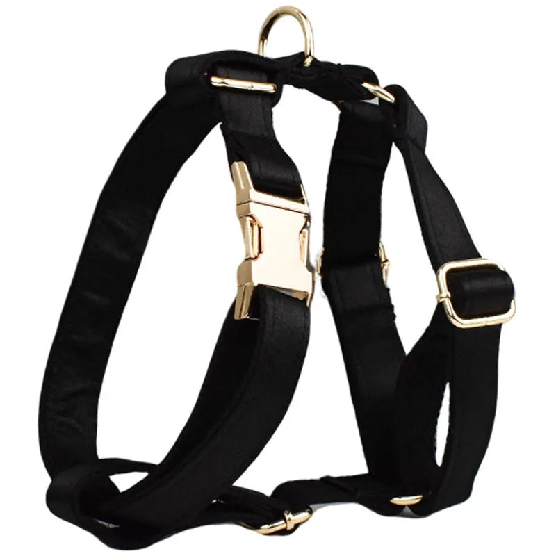 Cloth dog collar and leash set with chest strap, coordinating bow, and dog vest in multiple sizes.