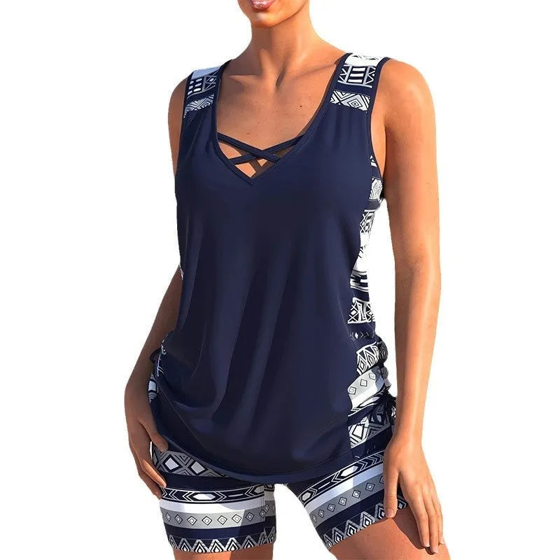 Women's polyester sleeveless conservative split swimsuit with hollow detailing in split swimsuit colour, available in sizes S M L XL XXL