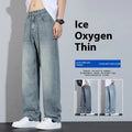 Straight-leg denim trousers in UK2560 blue with wide-leg silhouette and zip fly opening