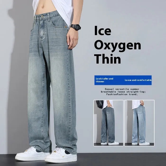 Straight-leg denim trousers in UK2560 blue with wide-leg silhouette and zip fly opening