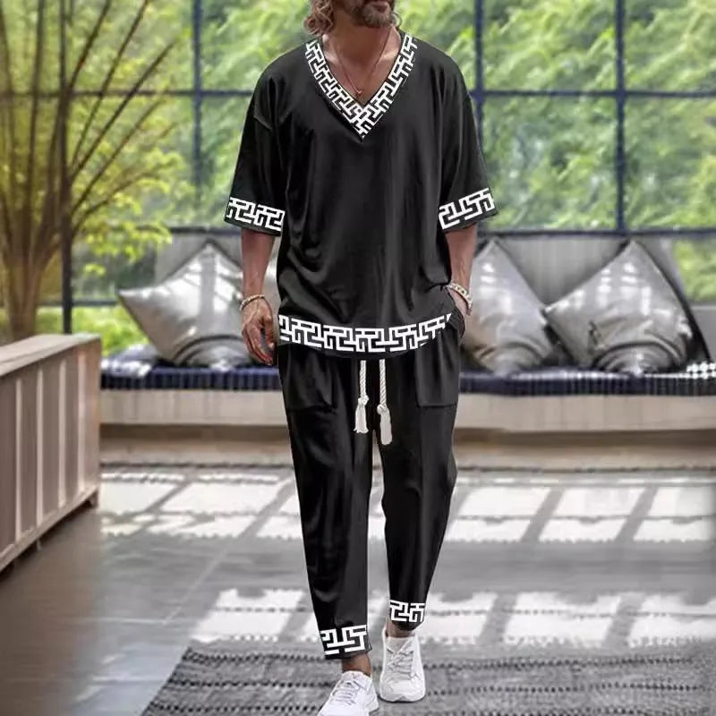 Two-piece trousers suit with V-neck cropped sleeve jacket in thin polyester fabric