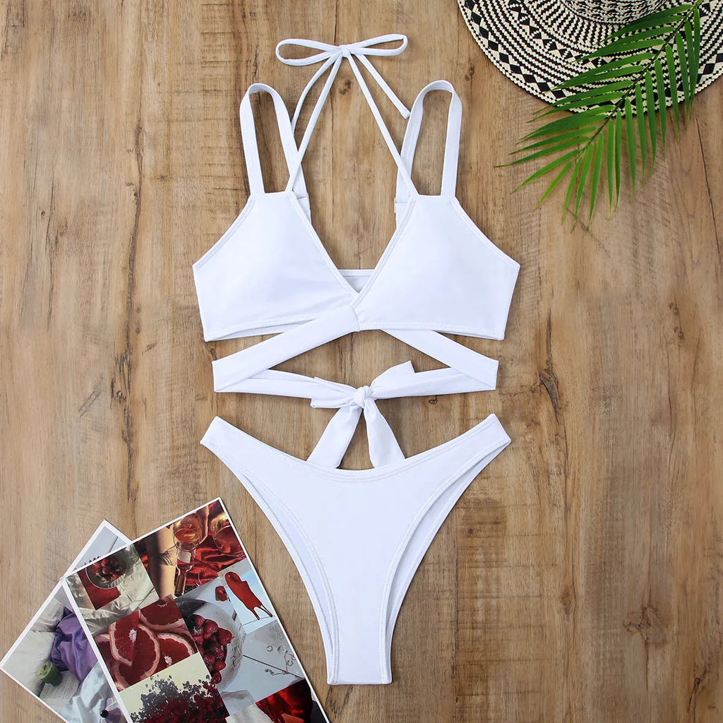 Women's solid colour strap bikini swimsuit in briefs style with multiple colour options
