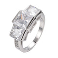 Electroplated copper women's ring ornament in various colours showing geometric rainbow design.