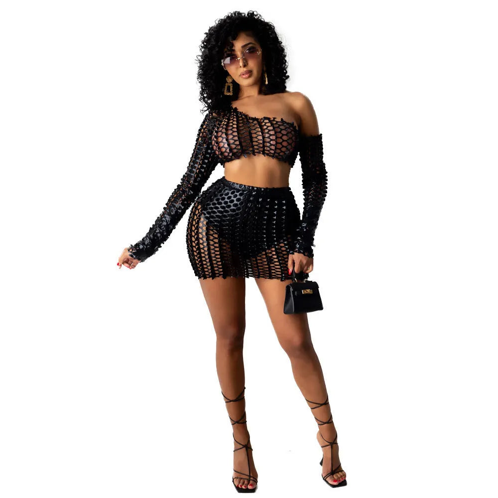 Women's hollow-out two-piece dress set with sleeveless top and short skirt in polyester fabric