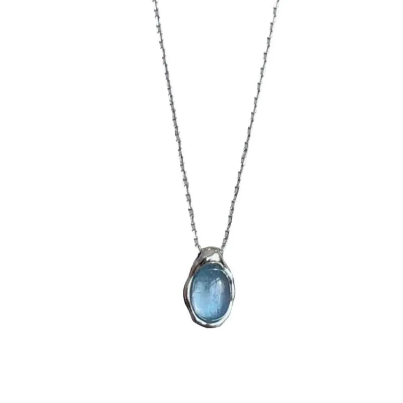 Navy blue water drop pendant necklace with geometric copper pendant on adjustable chain