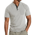 Plus size man wearing a solid colour short sleeve pullover shirt with a button chest pocket.