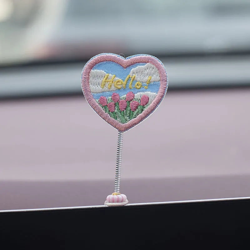 Set of six small PVC duckling ornaments and one larger Hello welcome sign for car interior decoration.