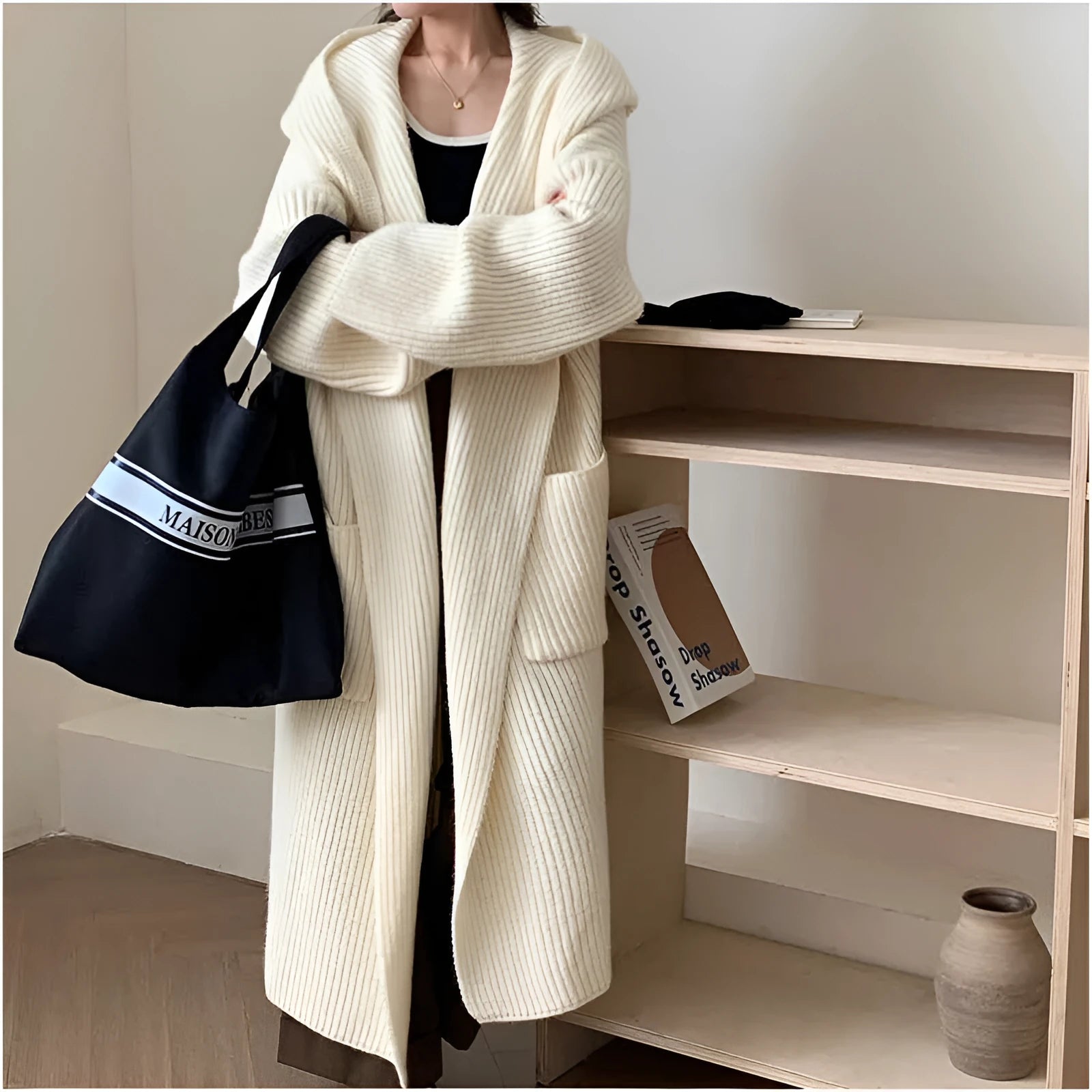 Loose hooded acrylic cardigan coat for women in beige colour with 80cm length and raglan sleeves