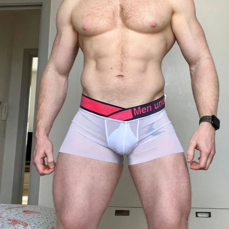 Men's low waist laser gradient underwear in black, red, and white colours with seamless construction