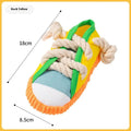 Flexible plastic dog chew toy shaped like a slipper in yellow, with a bendable design and sound chip.