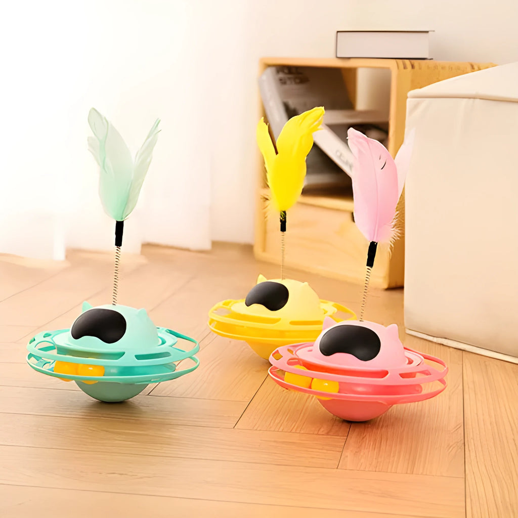 Pink cat tumbler turntable toy with automatic motion mechanism for indoor feline play