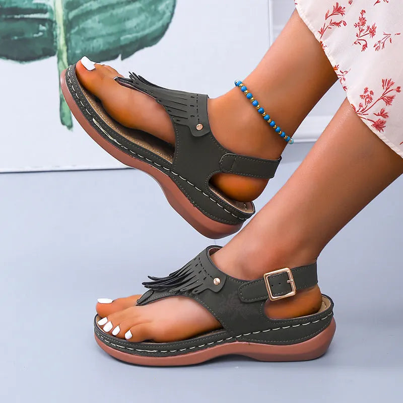 Women's Roman cutout thong wedge sandals with buckle closure in black, microfiber upper and polyurethane sole