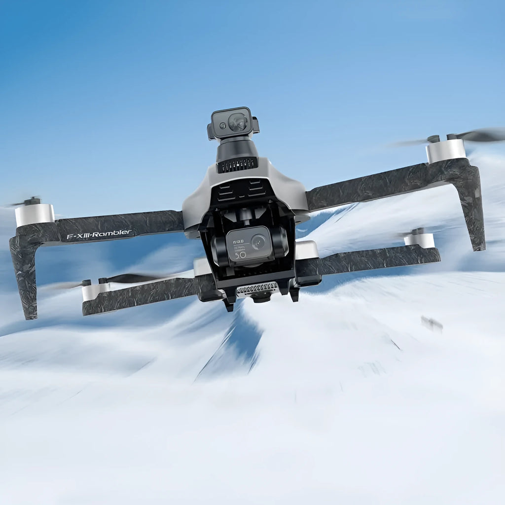 White folding quadcopter drone with camera, shown collapsed next to its remote control and shoulder bag.