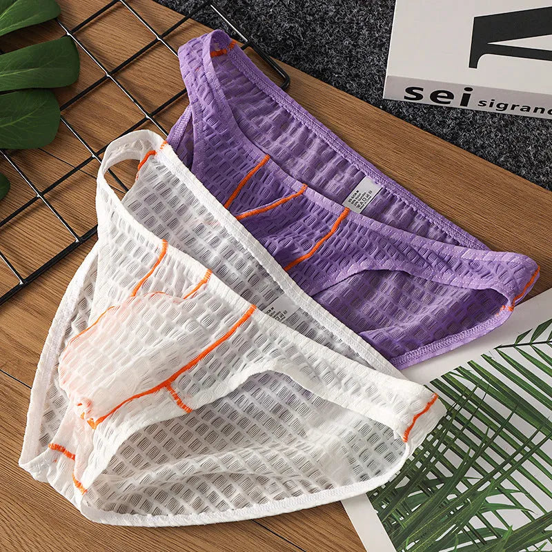 Men's low waist lace briefs in white, black, green, rose red, or light purple on a plain background.